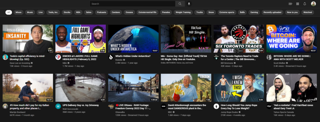 Image showing the YouTube homepage. Illustrates how YouTube CTR works by showing the difference between an impression and click.