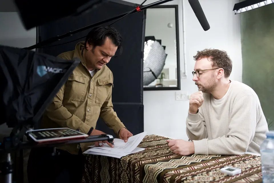Reviewing the script with the host