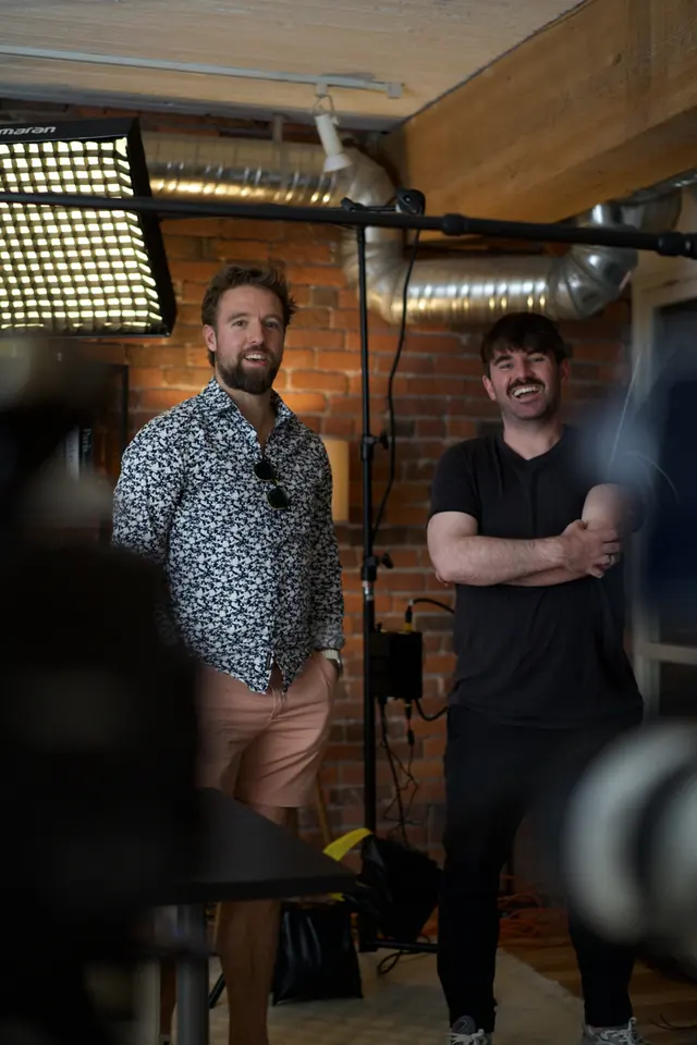 Two crew members in the brick studio